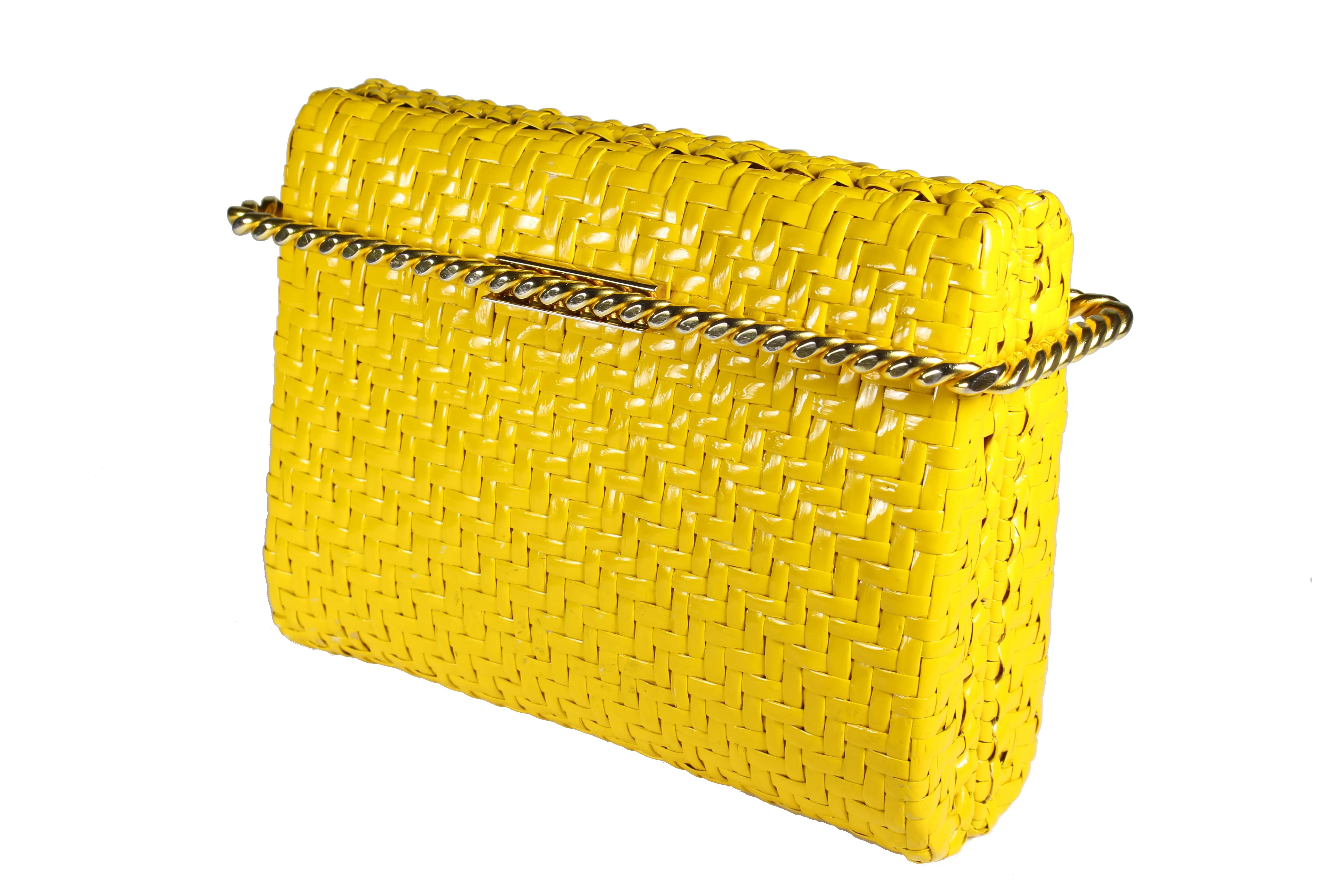 RODO mustard yellow wicker clutch