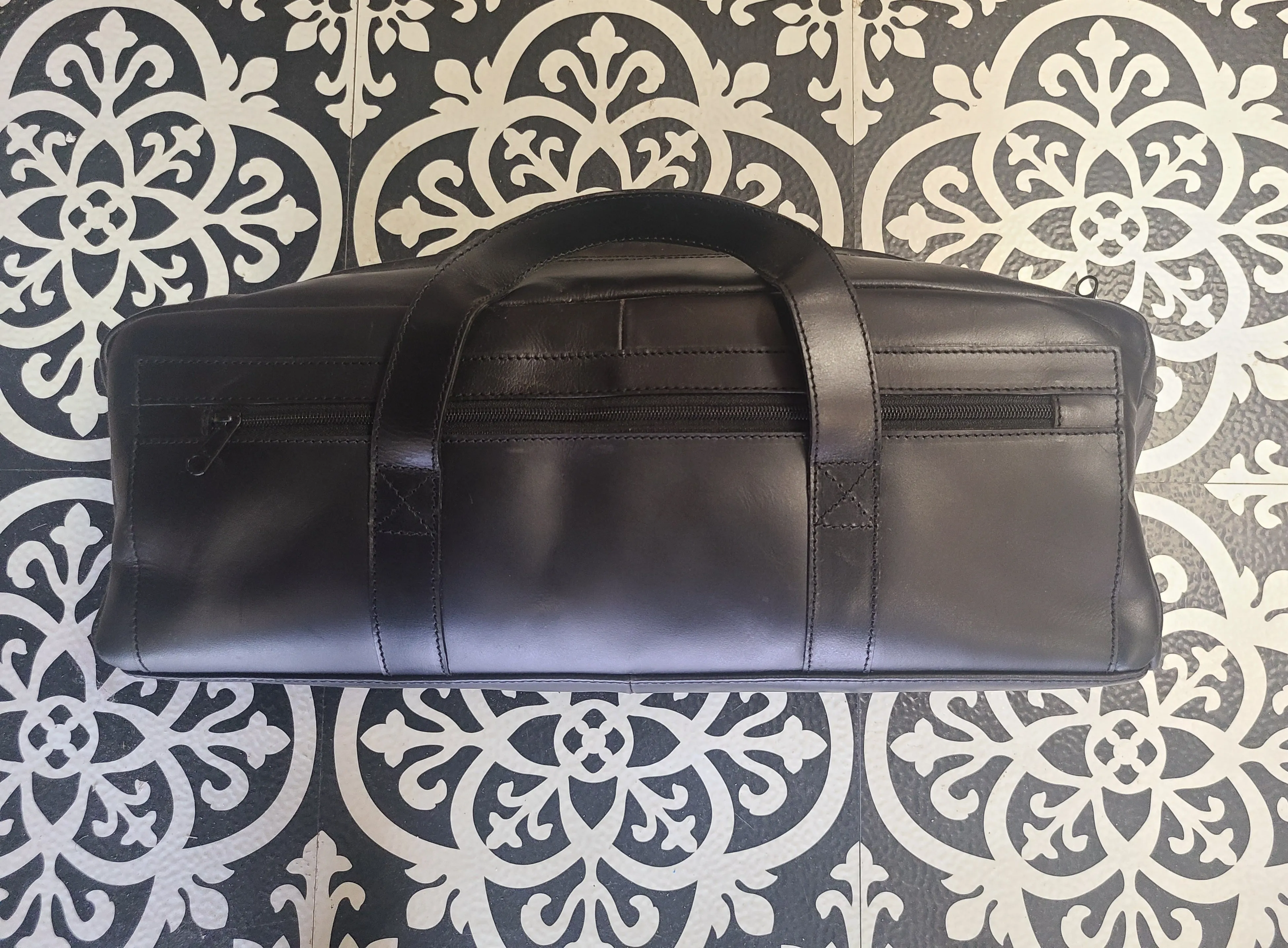 SLIM BLACK LEATHER CARRY-ON BAG